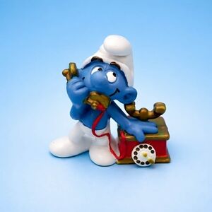 Charming Blue and White Toy Figure with Telephone